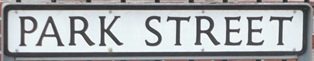 Hodkinsonsand Kenyons. Street sign Park Street, Ashton-under-Lyne. Hodkinsonsand Kenyons. Street sign Park Street, Ashton-under-Lyne.